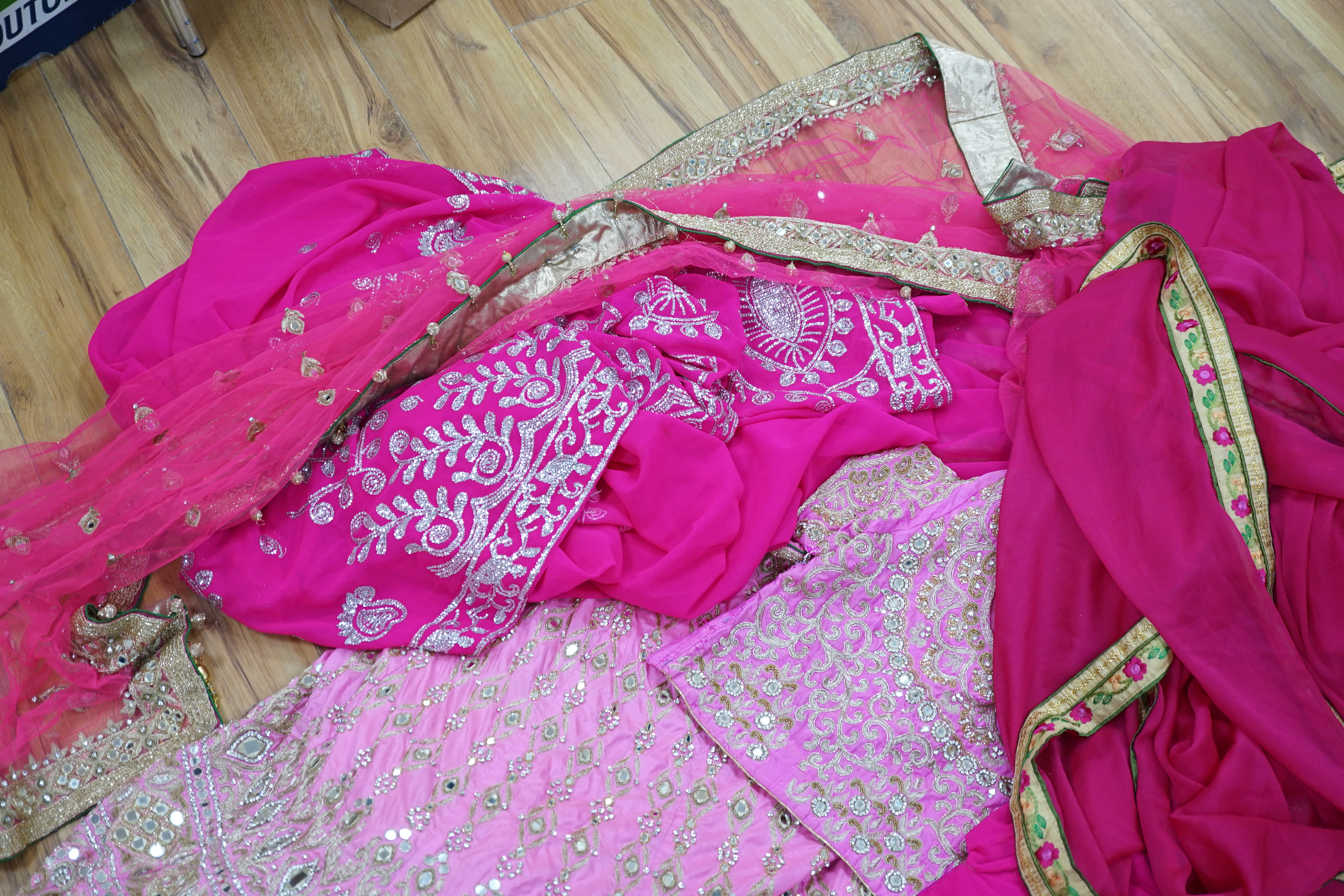 A collection of Indian silk saris and costume possibly bridal